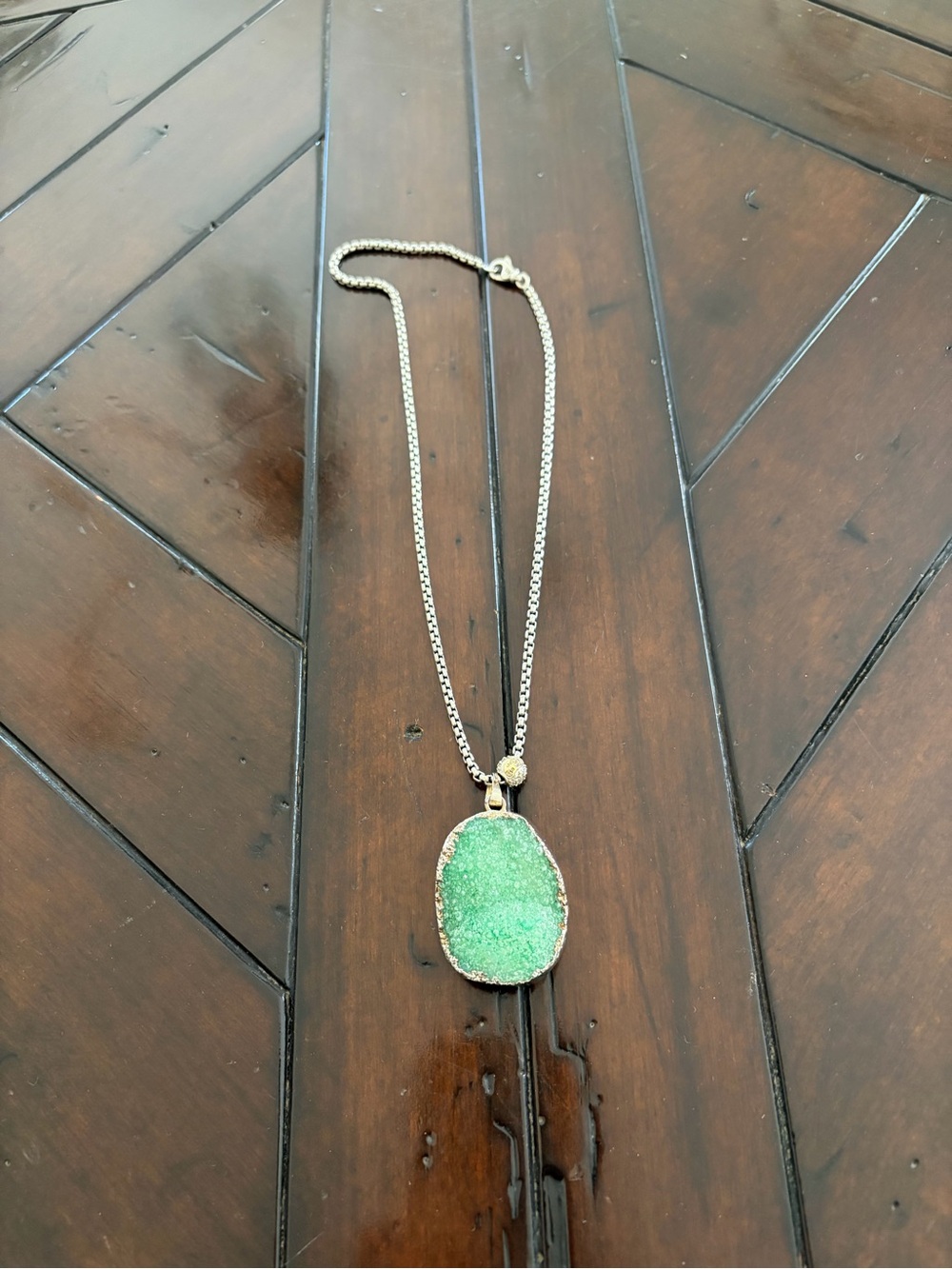 Green semi-precious stone pendant. Chain not included